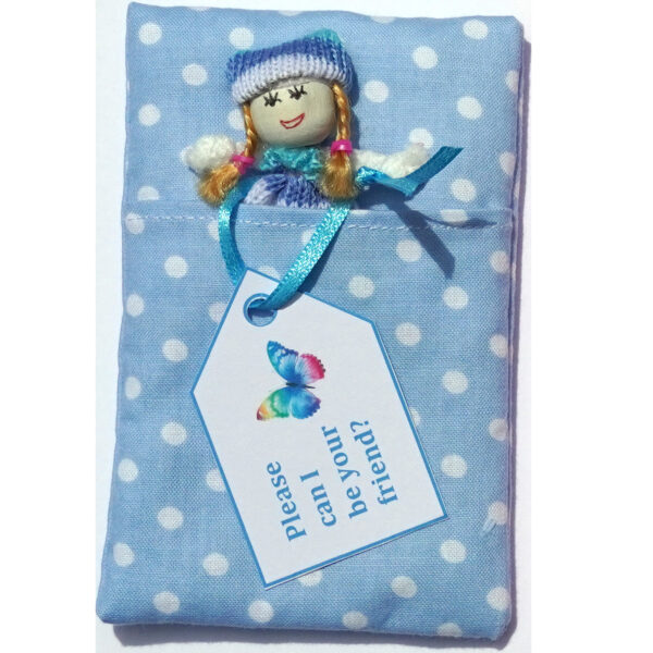 doll in blue sleeping bag